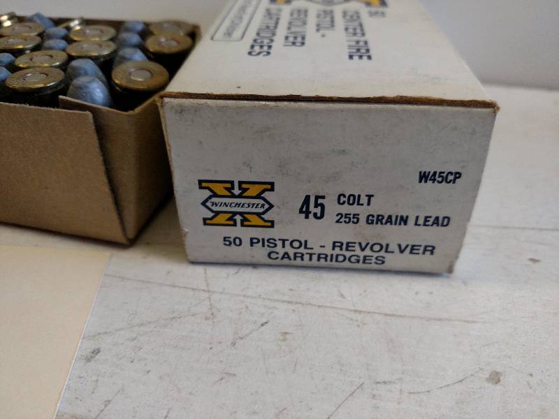 lot 36 image: (45) Winchester 45 Colt...