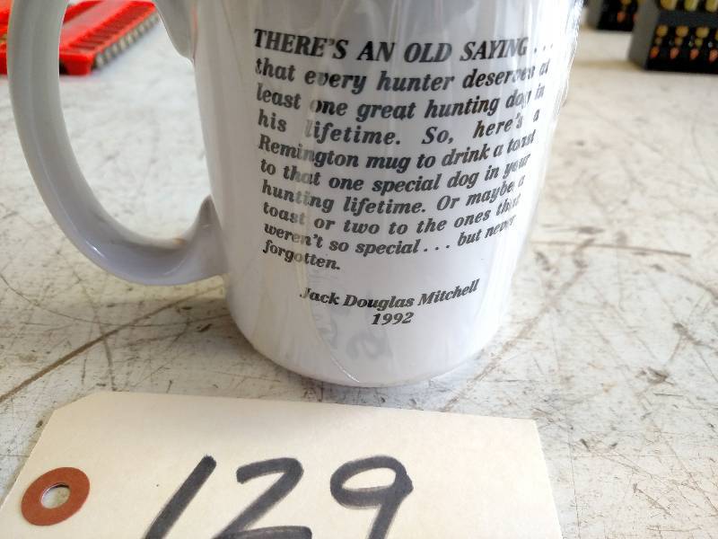 lot 129 image: Remington Mug with (350) 22 Bullets...