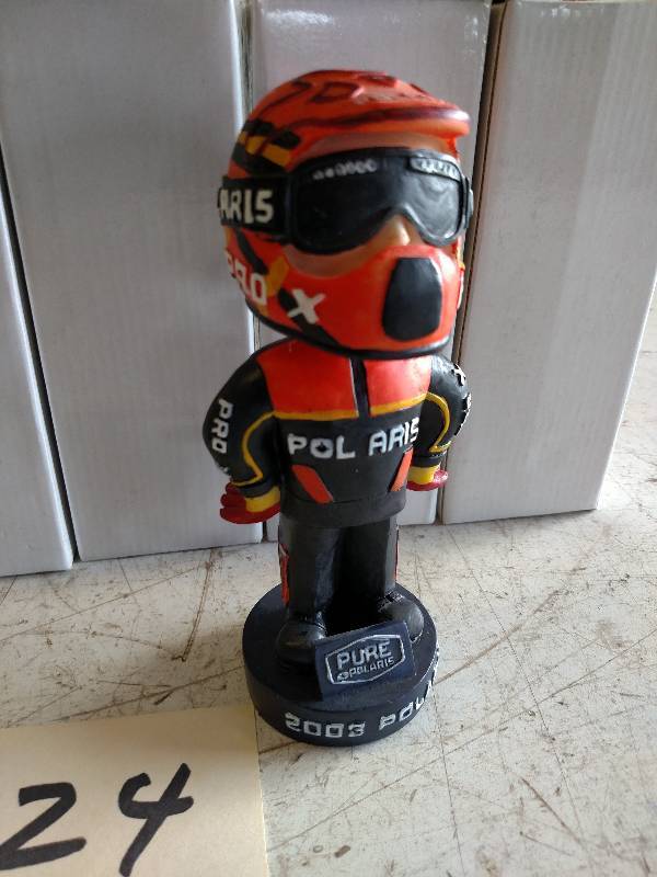 lot 324 image: (4) Polaris Bobbleheads...