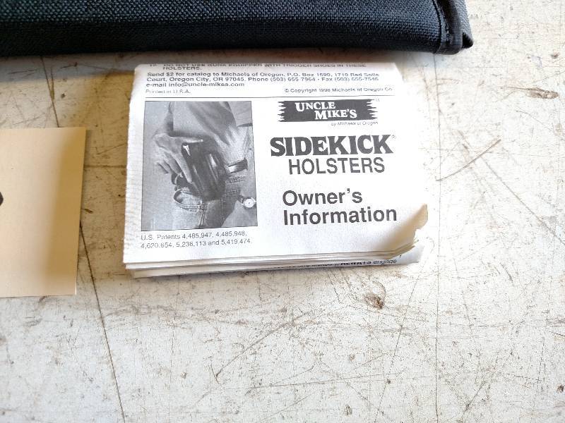 lot 343 image: Gun Cleaning Kit & Holster...