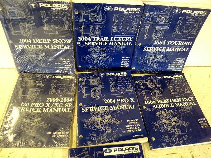 lot 87 image: 2004 Polaris Snowmobile Manuals...