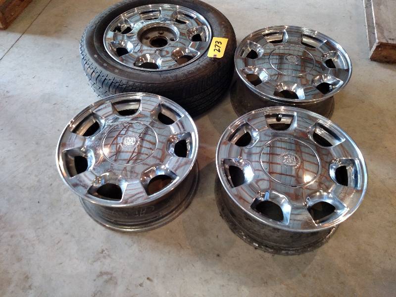lot 273 image: (4) 16 Aluminum Cadillac Rims (1) ...