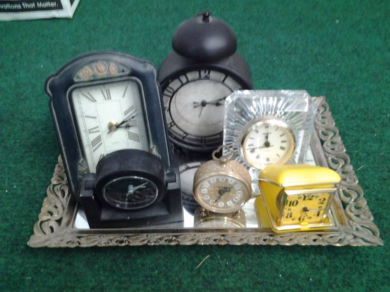 lot 56 image: Collection Of Old ClocksSmall Gold Colored Marked W.Germany Linden, Crystal Marked France, Several Others, Includes Dresser Tray Mirror