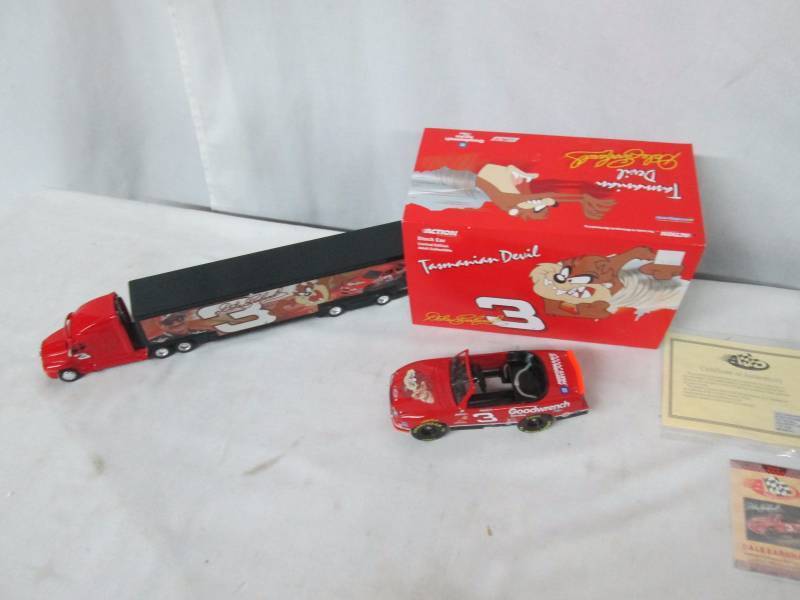 lot 111 image: Dale Earnhardt Stock Car and Semi w Trailer
