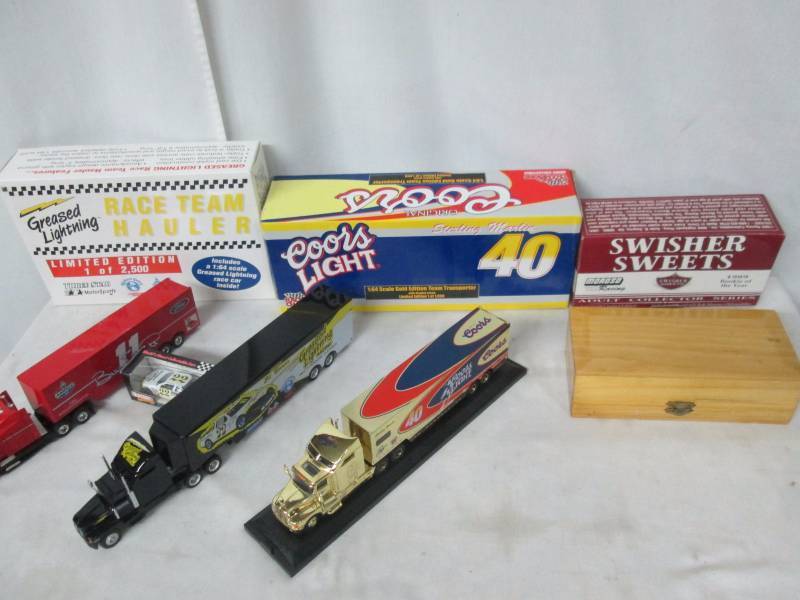 lot 135 image: 4 Piece Car Hauler  NASCAR Memorabilia Set