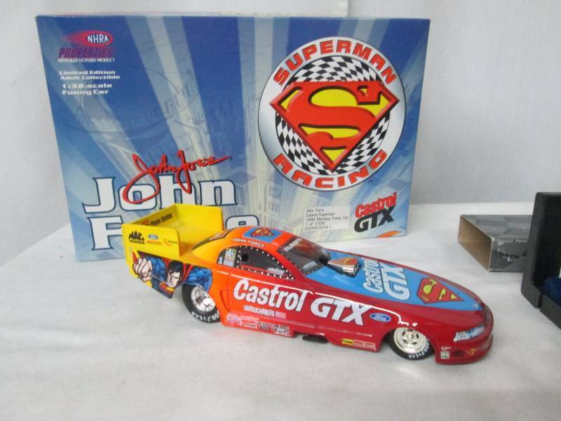 lot 137 image: 4 Piece Racing Collectible Set
