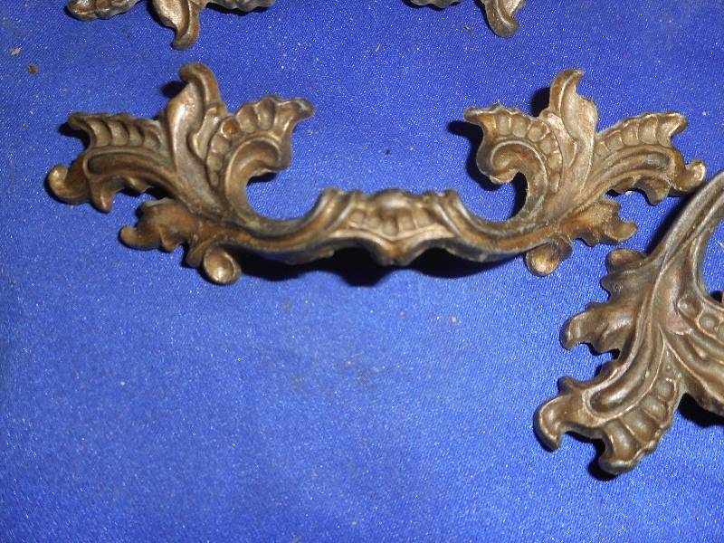 4 ANTIQUE BRASS DRAWER HANDLES