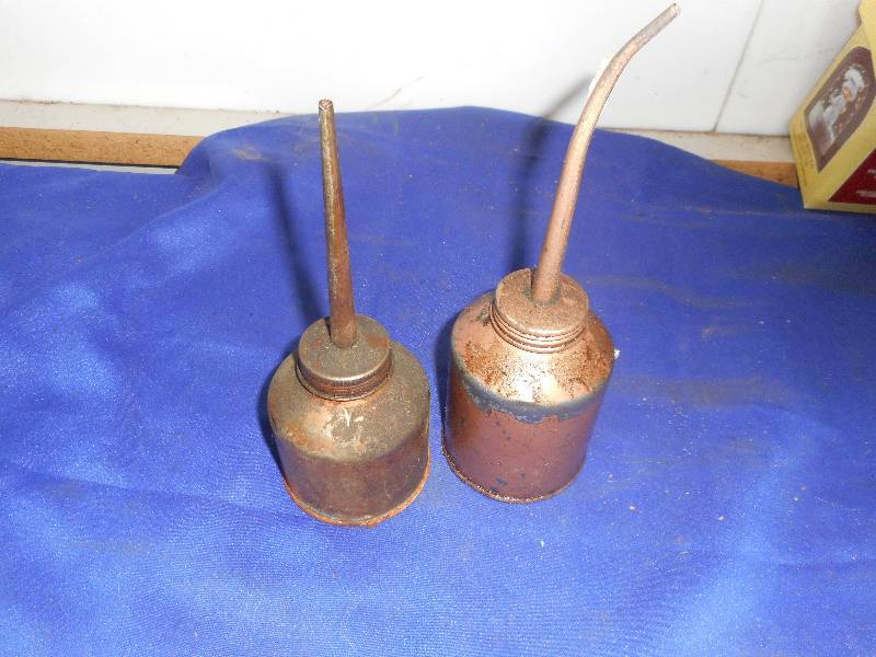 2 VINTAGE METAL OIL CANS