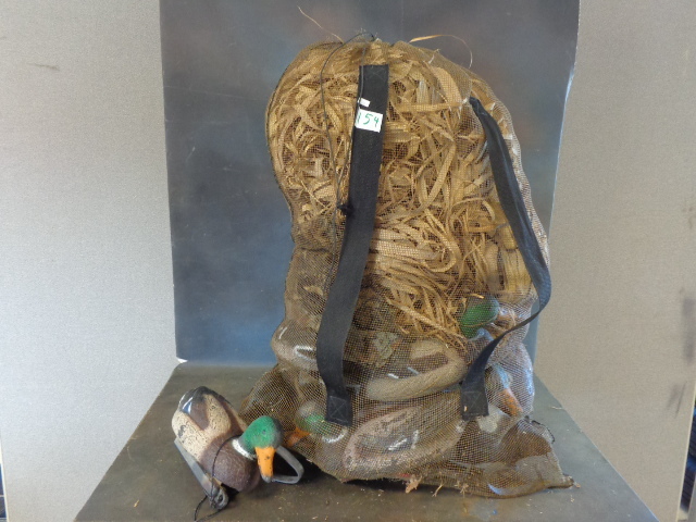 lot 154 image: Duck Decoys & Grass