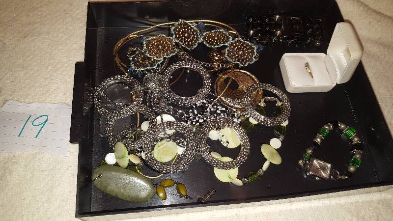 Lots of Jewelry. I do not know anything about the Jewelry or its worth.   Please view pictures closely.