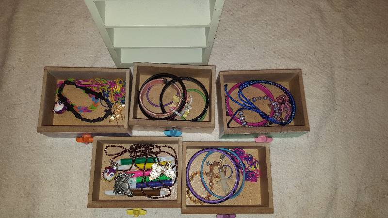 Lots of Kids Jewelry. I do not know anything about the Jewelry or its worth.   Please view pictures closely.