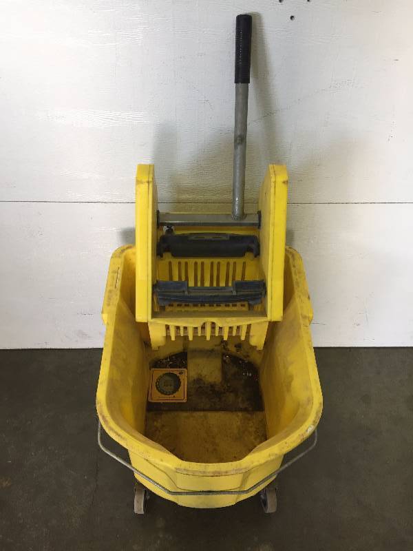 WASH BUCKET AND CAUTION SIGN