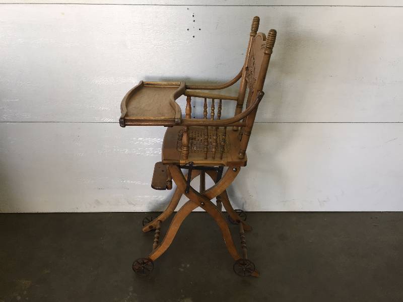 VINTAGE HIGH CHAIR ON WHEELS