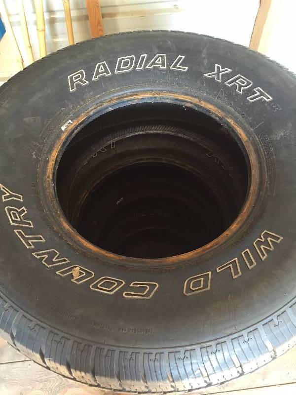 2657515 TIRES WITH A LITTLE LESS THEN HALF TREAD LEFT