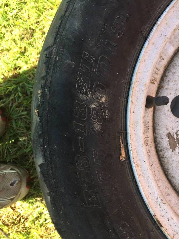 FOUR SPARE TRAILER TIRES 2 IN GOOD SHAPE 2 ARE GONE BUT RIMS ARE GOOD