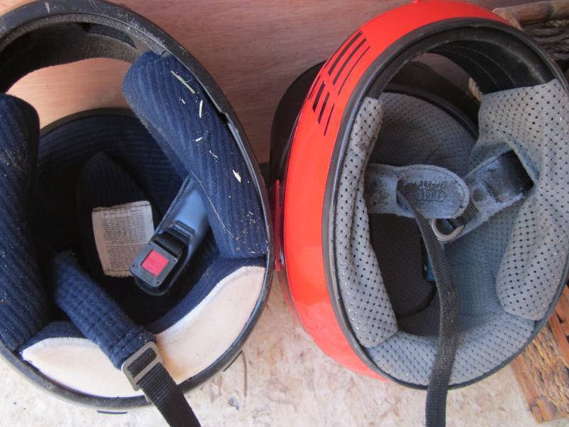 2 helmets and 2 wicker baskets