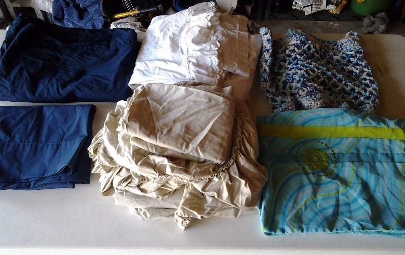 lot 53 image: Macrame Tote Bag, Fancy Aqua Pillow Cover, Navy Twin Duvet Cover, Navy King Pillow Cases,