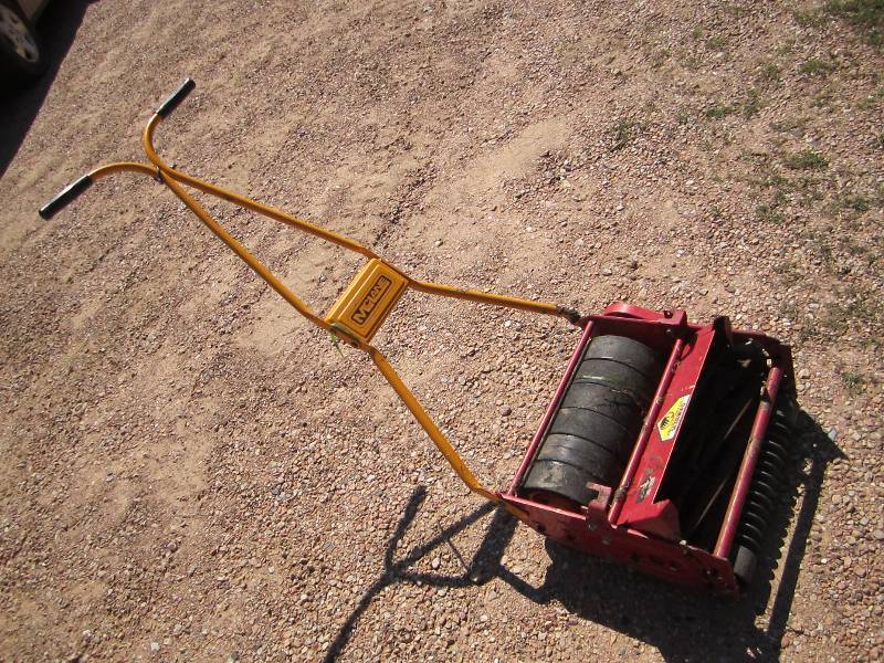 Push greens mower...