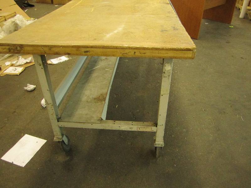 9 x 3 foot work table, wheels on on...