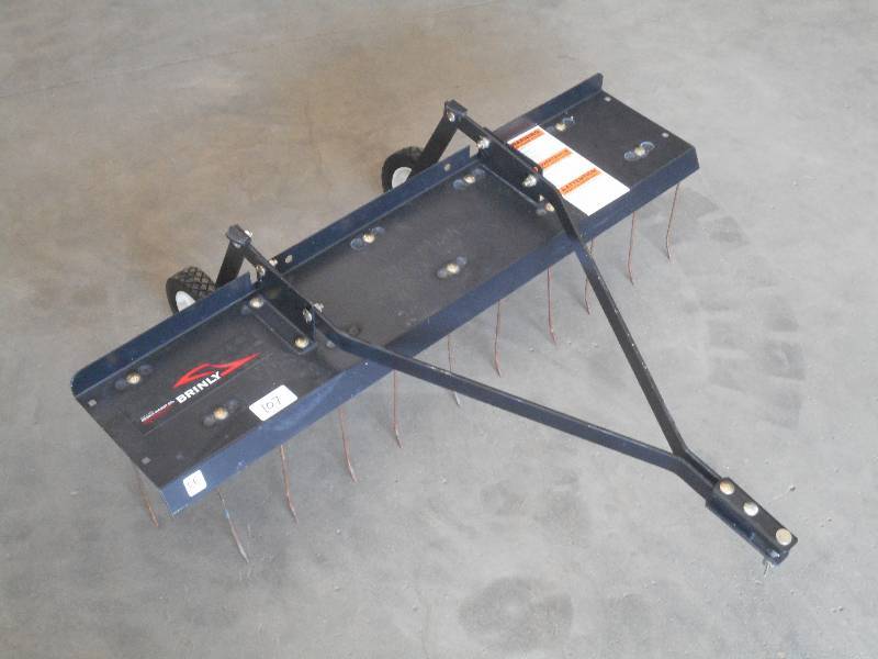 lot 107 image: Brinly Pin-Hitch Lawn De-Thatcher, ...