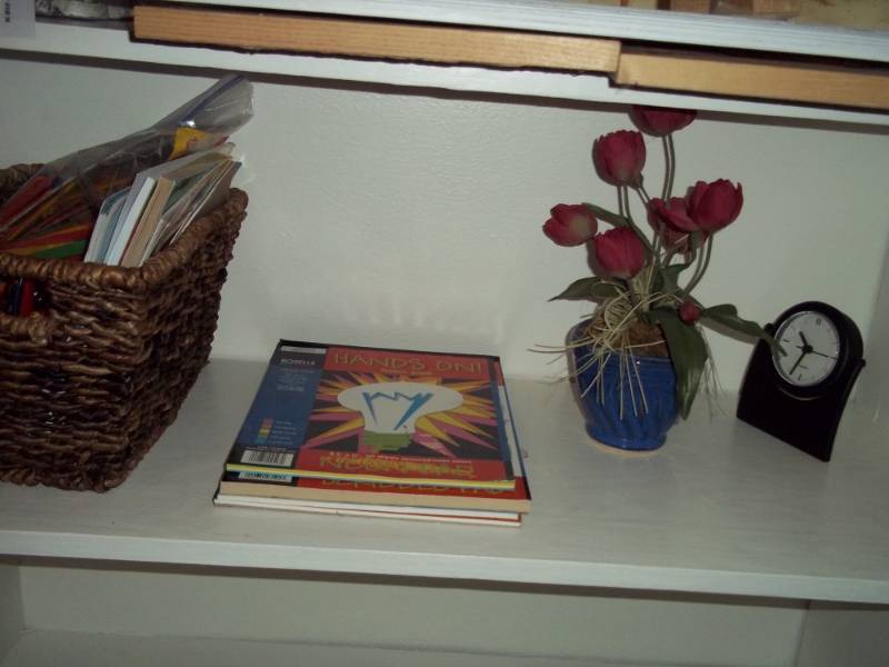 Wicker Basket of Childrens Books, Clock, Silk Roses