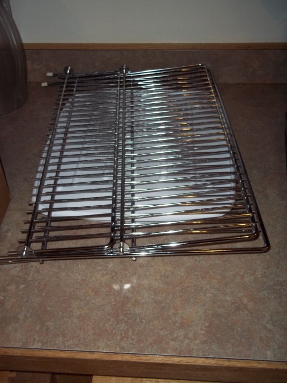 Folding drying rack with drip tray