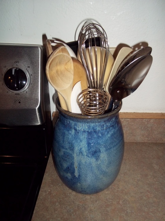 cooking utensil with holder