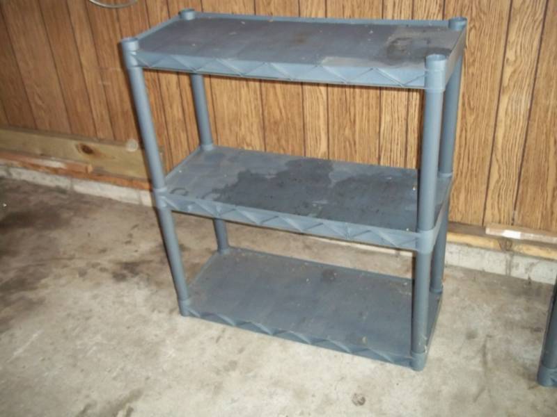 Black plastic shelf