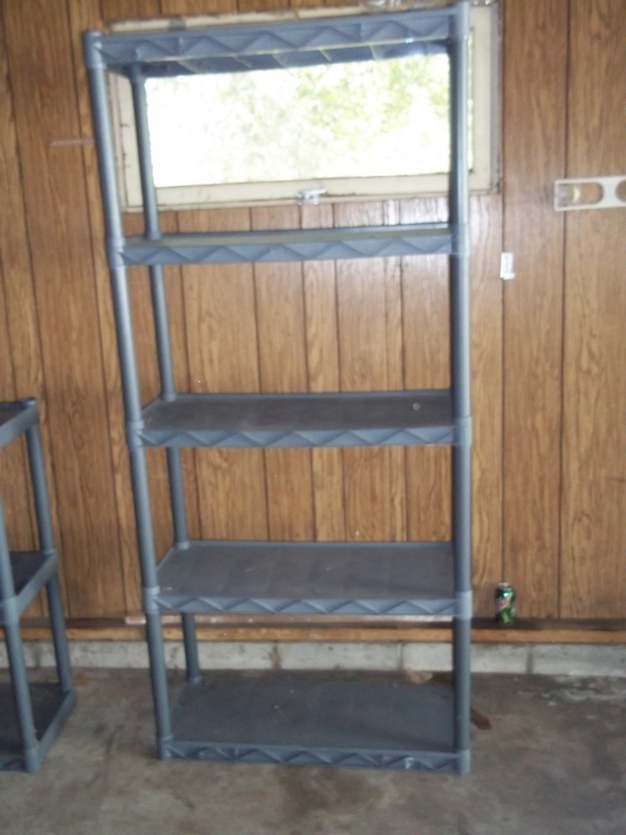 Black plastic shelf