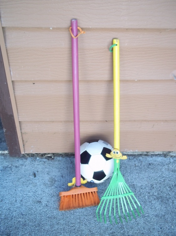 Toy Rake and broom with soccer ball