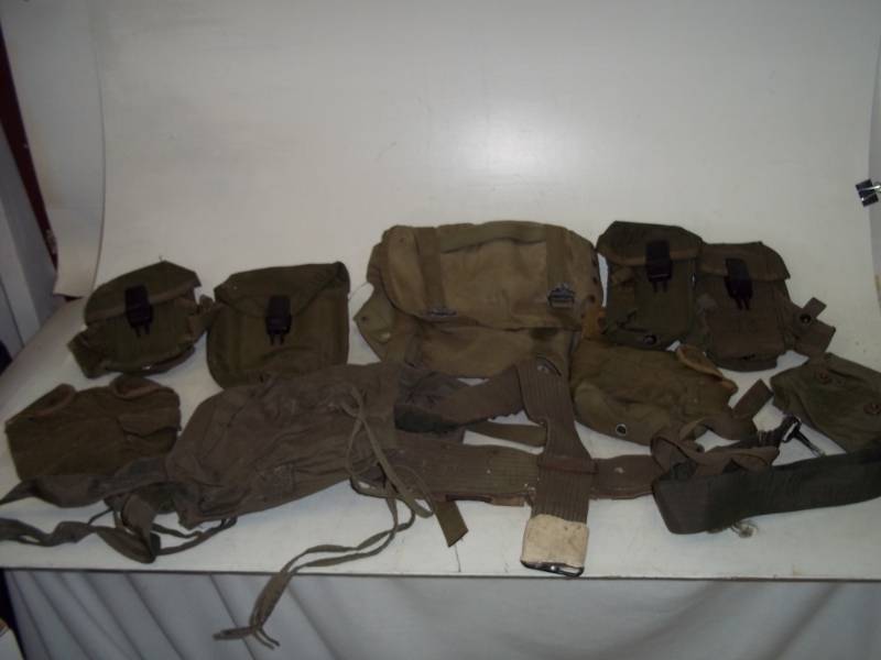 lot 10 image: US Army Group with Belts, Ammo and Canteen Carriers
