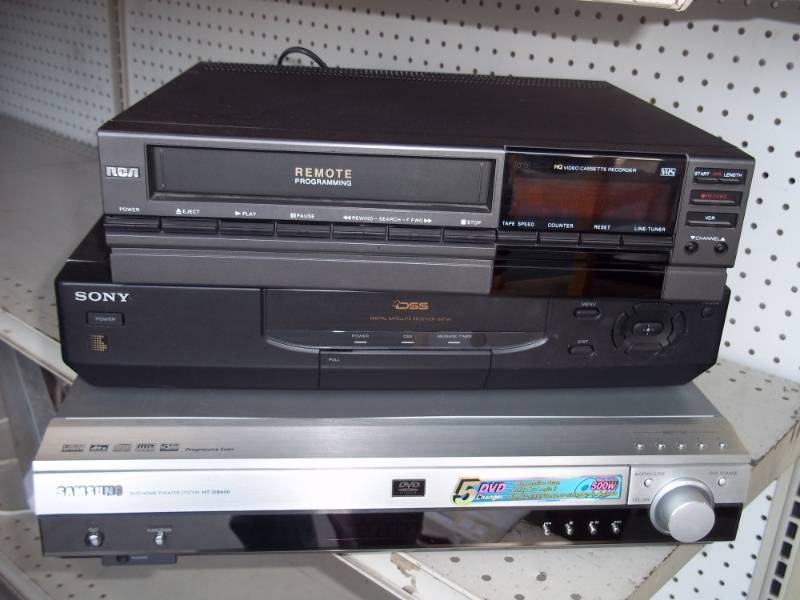 lot 103 image: VHS Player, DSS Tuner, and DVD Home Theater System