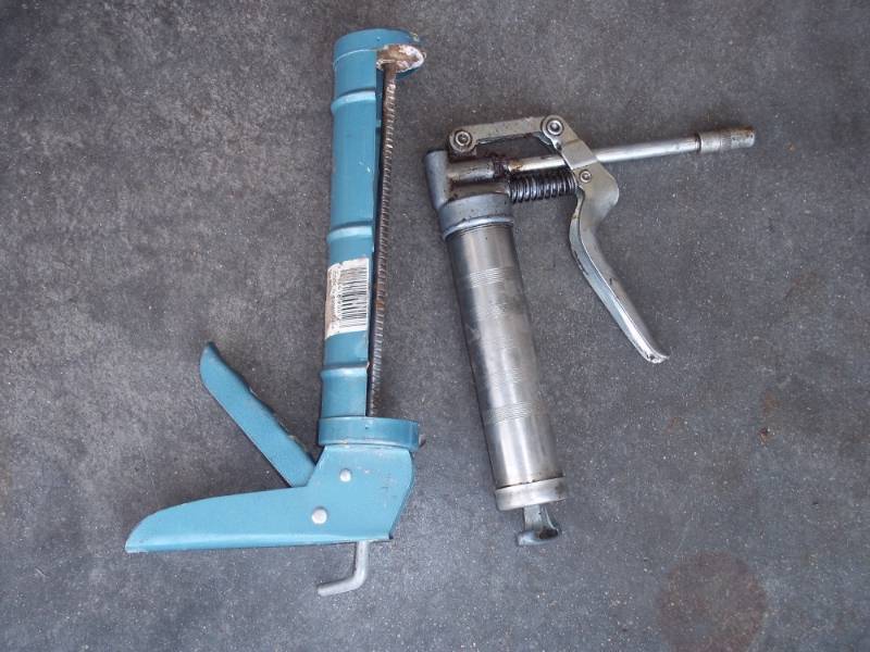 lot 167 image: Small Grease Gun and Caulking Gun