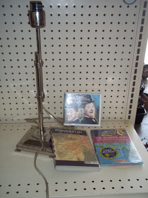 lot 182 image: Set of DVDs  and Lamp