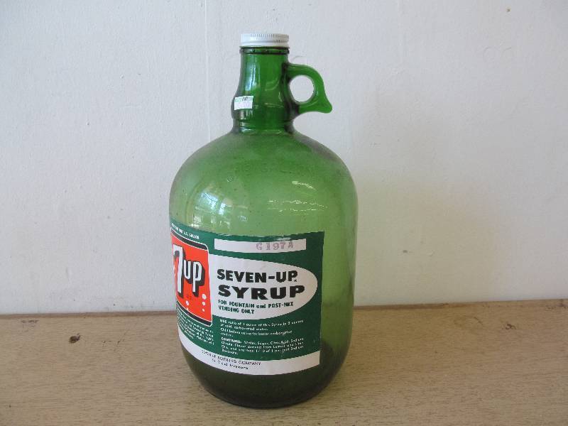 lot 103 image: 7-Up Syrup Jug