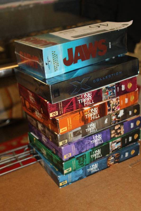 lot 46 image: Lot of DVD Including One Tree Hill Seasons 1-6, XMen, Sealed Collectible Jaws