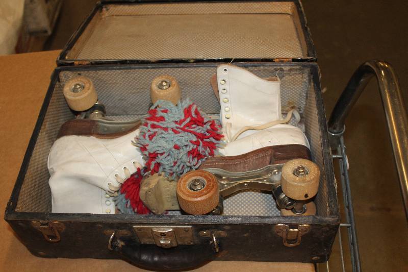 lot 384 image: Vintage Roller Skates w Wood Wheels & Trunk