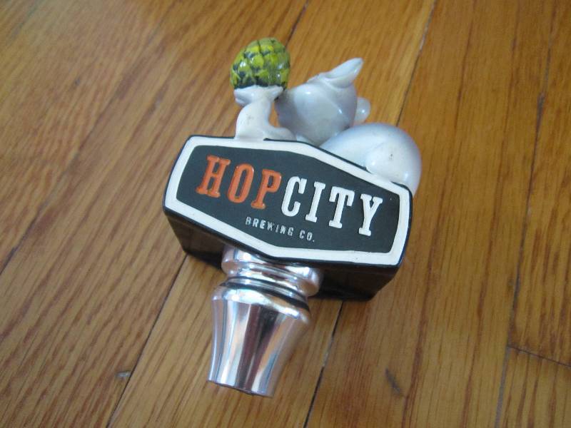 Hop city brewing co beer tap...