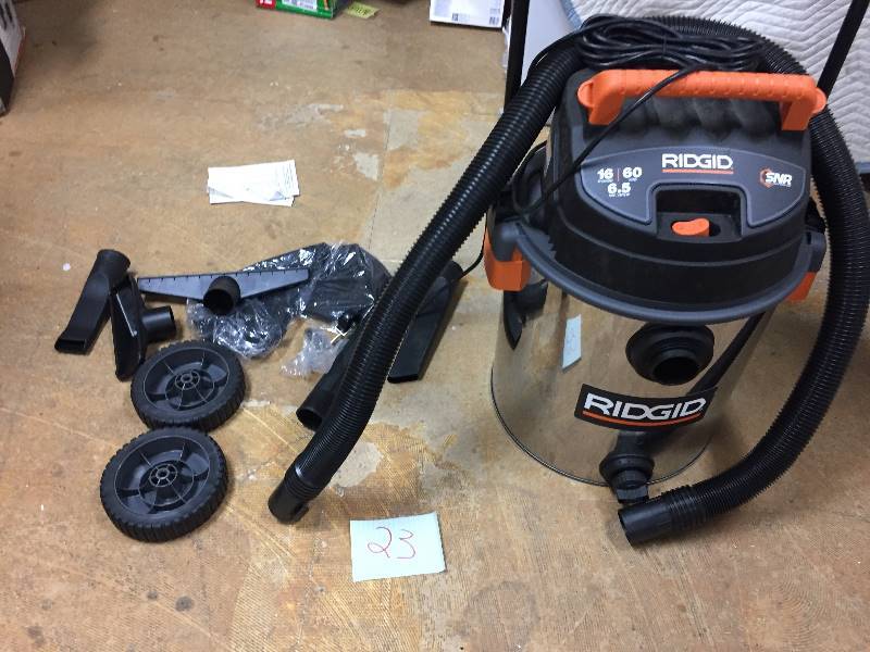 lot 23 image: Ridgid 16 gal. 6.5-Peak HP Stainless Steel Wet Dry Vac in like new working conditions