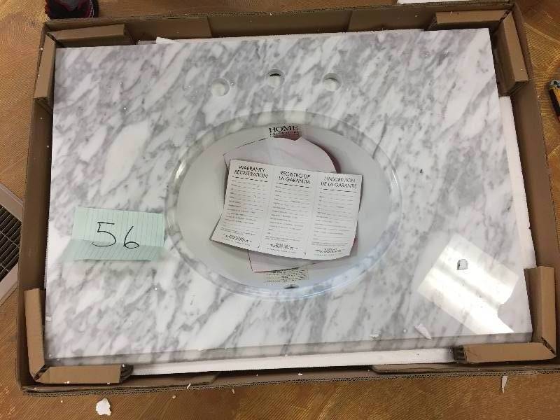 lot 56 image: Pegasus 31 in. W Marble Vanity Top in Carrara with White Basin