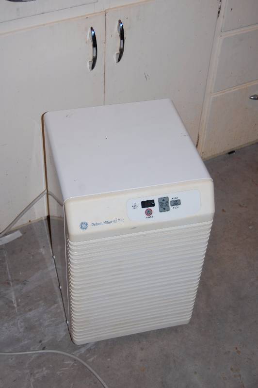 lot 243 image: GE Dehumidifier