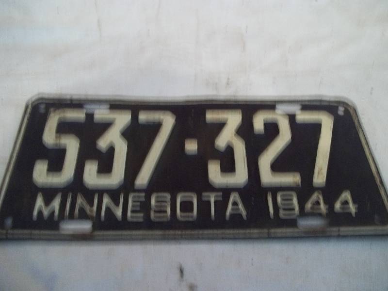 lot 618 image: License Plates and Books