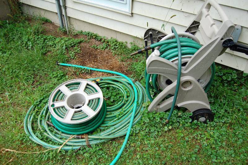 lot 770 image: Garden Hose and Reel