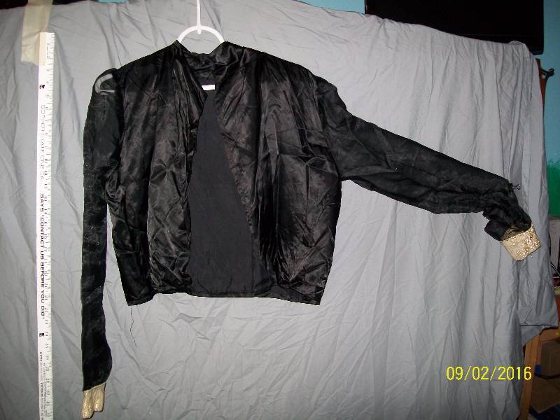 lot 11 image: Adult Costume. Unknown Size. Arabian Night Belly Dancer  Sheer Black Midnight Top, Pants, with Sash.