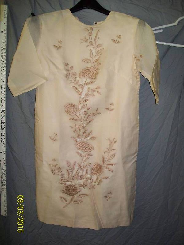 lot 10 image: Adult CostumeOriental Satin-Like Tunic with Intricate Floral Design.