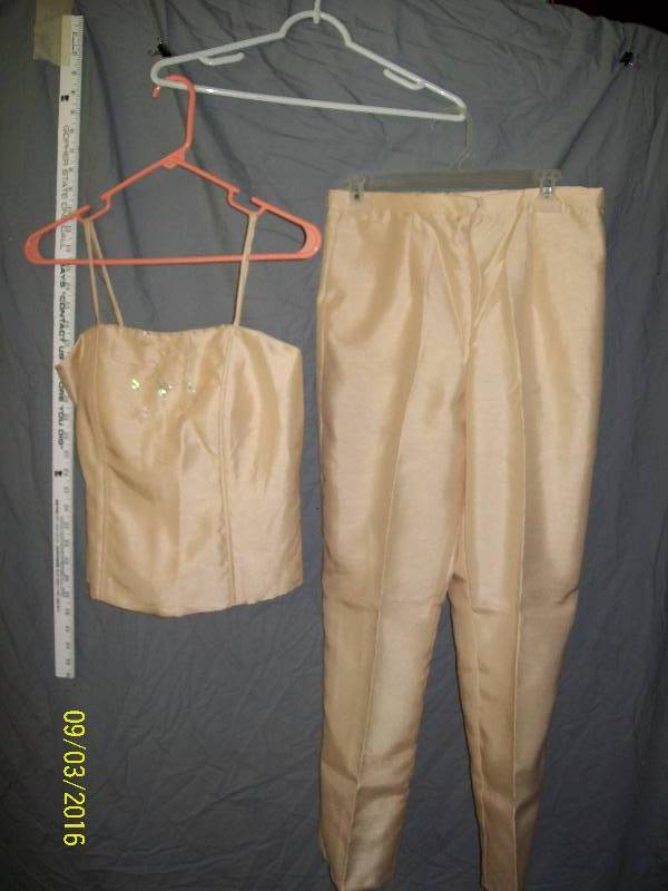 lot 12 image: Adult CostumeSatin-Like Cream Colored Pants & Bodice Outfit. Unknown size. Tag on Pants S