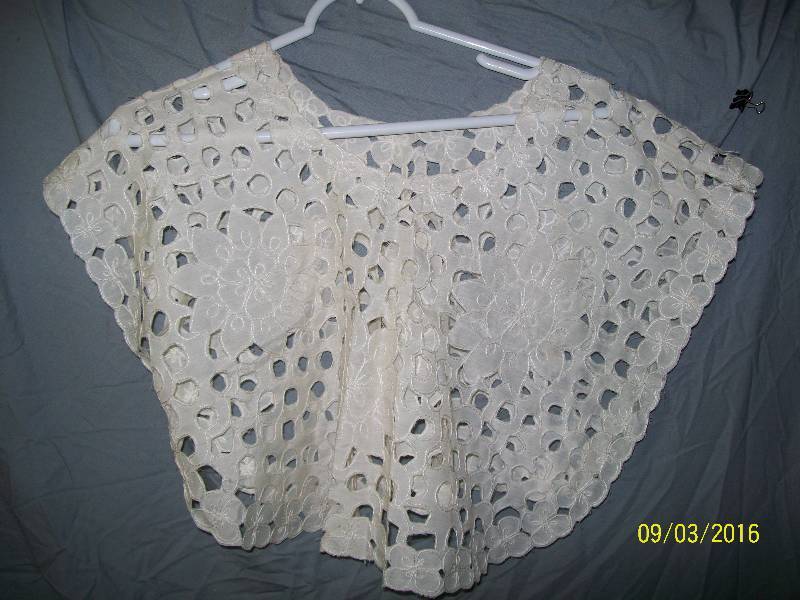 lot 16 image: Adult CostumeBridal Cape Shawl Design. Unknown Size. No Tags. One side stitched for armother side open