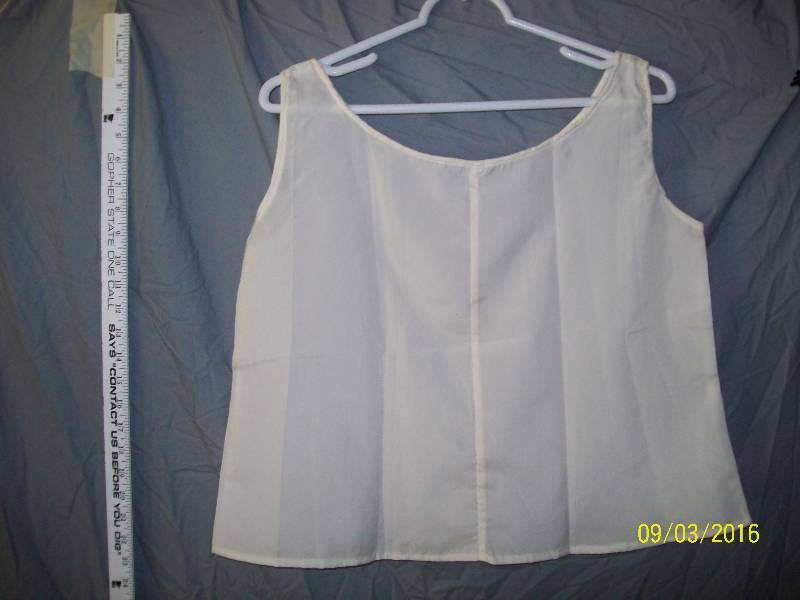 lot 17 image: Adult CostumeWhite-ish Satin-Like Camisole. Unknown Size. Tag S.