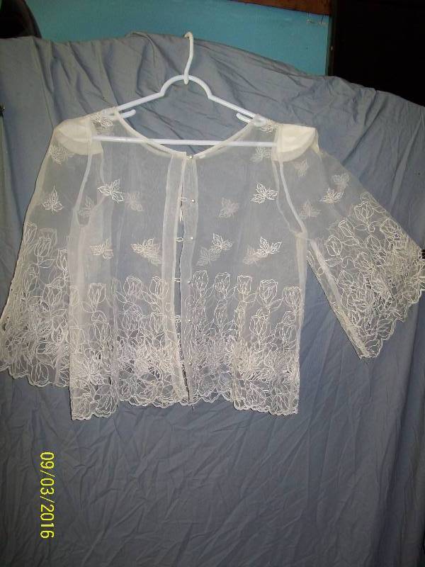 lot 21 image: Adult CostumeSheer Jacket Cover with Intricate Falling Leave Design. TagS. Simulated Pearl Button