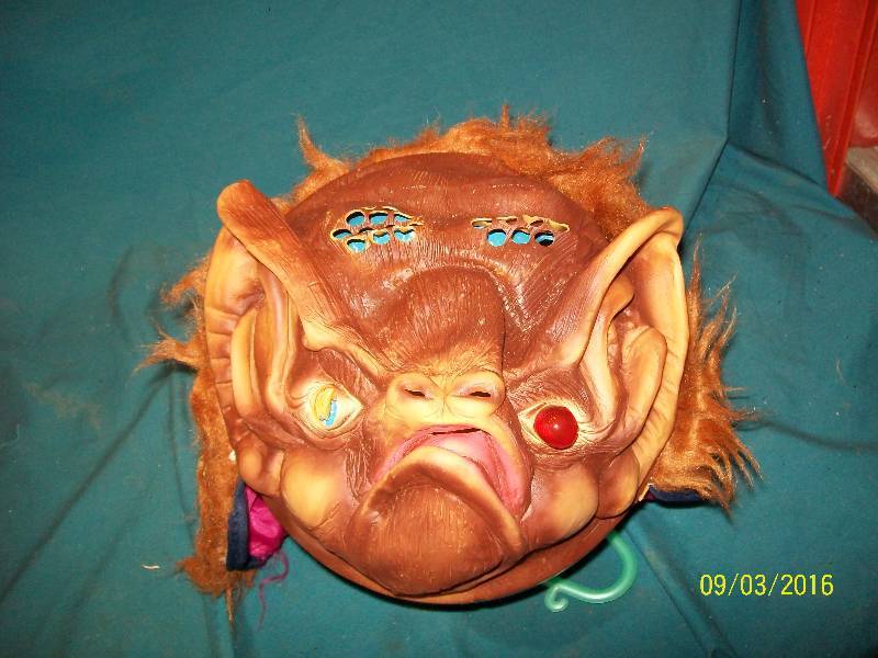 lot 45 image: Kid Costume Mask Bat with one Red Eye. Condition Previously Owned. Worn. Missing One Red Eye.